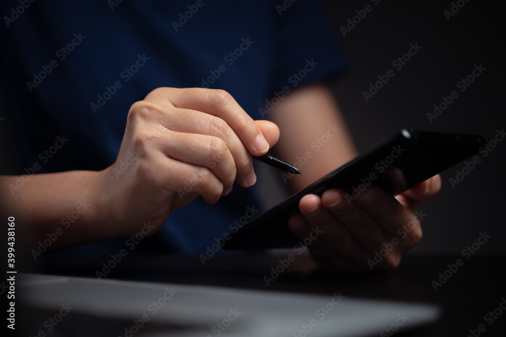 Hands using smart pen and working with laptop. Hands using smart pen and working with laptop.