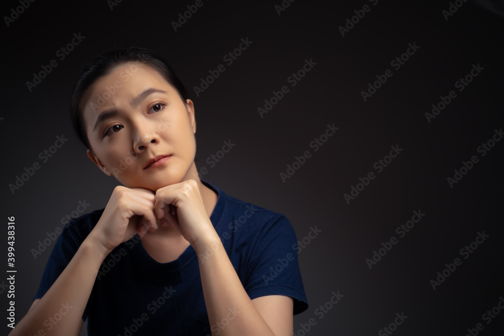 Asian woman thinking about problem, worried and confused emotion. Asian woman thinking about problem, worried and confused emotion.