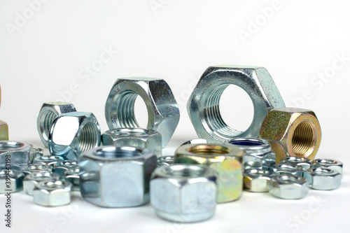 close-up of various metal nuts for fastening products