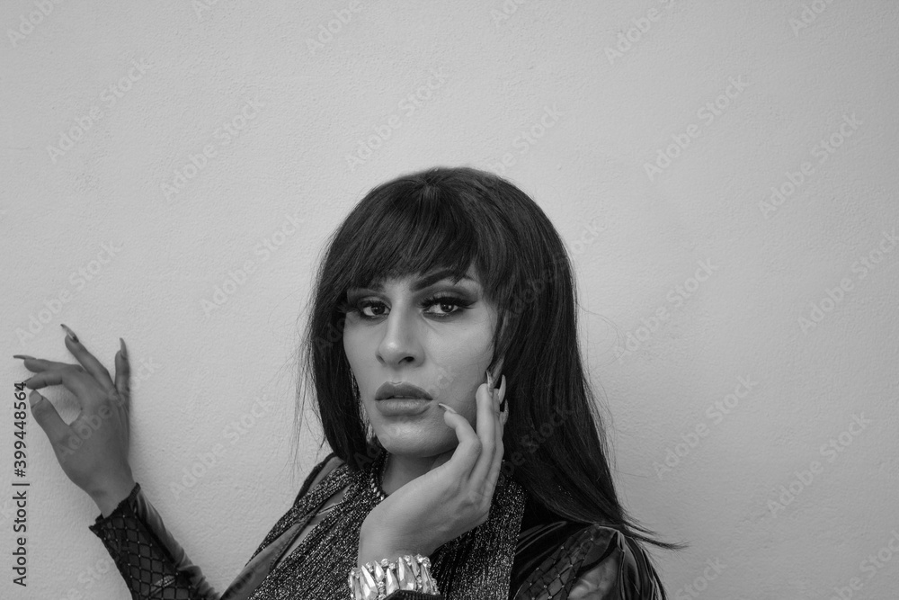 Portrait On Black And White Of Transgender Latina Wearing An Exotic 