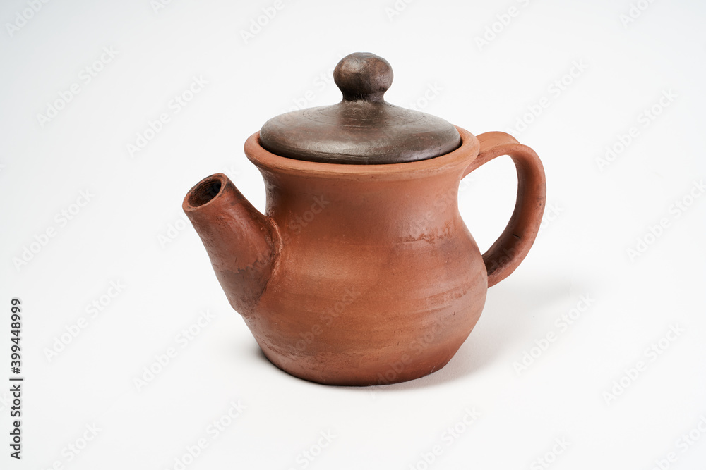 ceramic product with your own hands, made on a Potter's wheel, isolated on a white background ceramic product with your own hands, made on a Potter's wheel, isolated on a white background