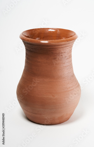 ceramic product with your own hands, made on a Potter's wheel, isolated on a white background