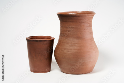 ceramic product with your own hands, made on a Potter's wheel, isolated on a white background © nikolay_alekhin