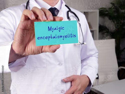 Health care concept meaning Myalgic encephalomyelitis with inscription on the piece of paper. photo