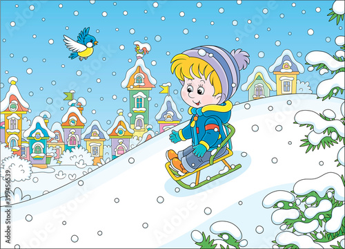 Happy little boy sledding down a snow hill on a playground in a snowy park on a beautiful frosty day on winter holidays, vector cartoon illustration