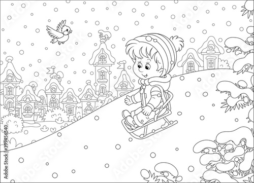 Happy little boy sledding down a snow hill on a playground in a snowy park on a beautiful frosty day on winter holidays, black and white outline vector cartoon illustration for a coloring book page