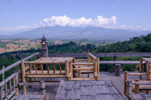 Bamboo tables and chairs on view point terrace with beautiful background