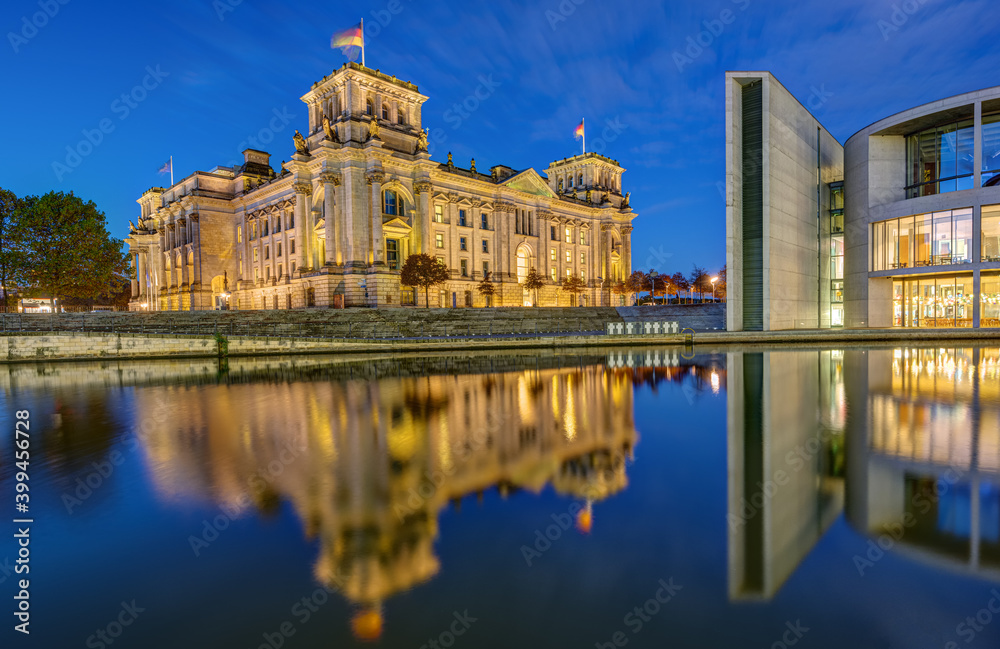 The Reichstag and part of the Paul-Loebe-Haus at the river Spree in Berlin at dawn