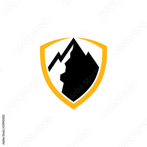 Shield and mountain emblem badge logo template in black and yellow color
