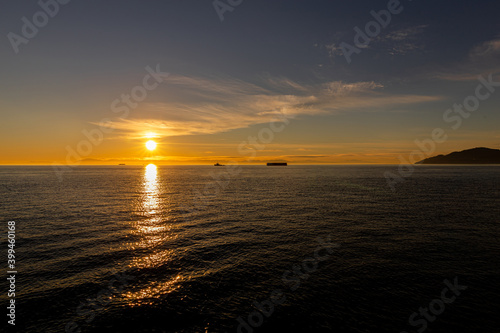 Tugboat and Barge on the Salish Sea with Vancouver Island in the background © Paul Van Buekenhout