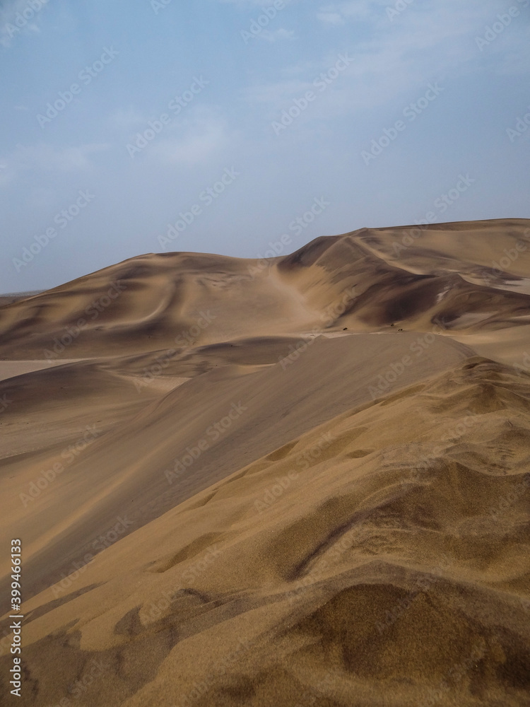 Fototapeta premium Photograph of a sand dune in the Namib Desert