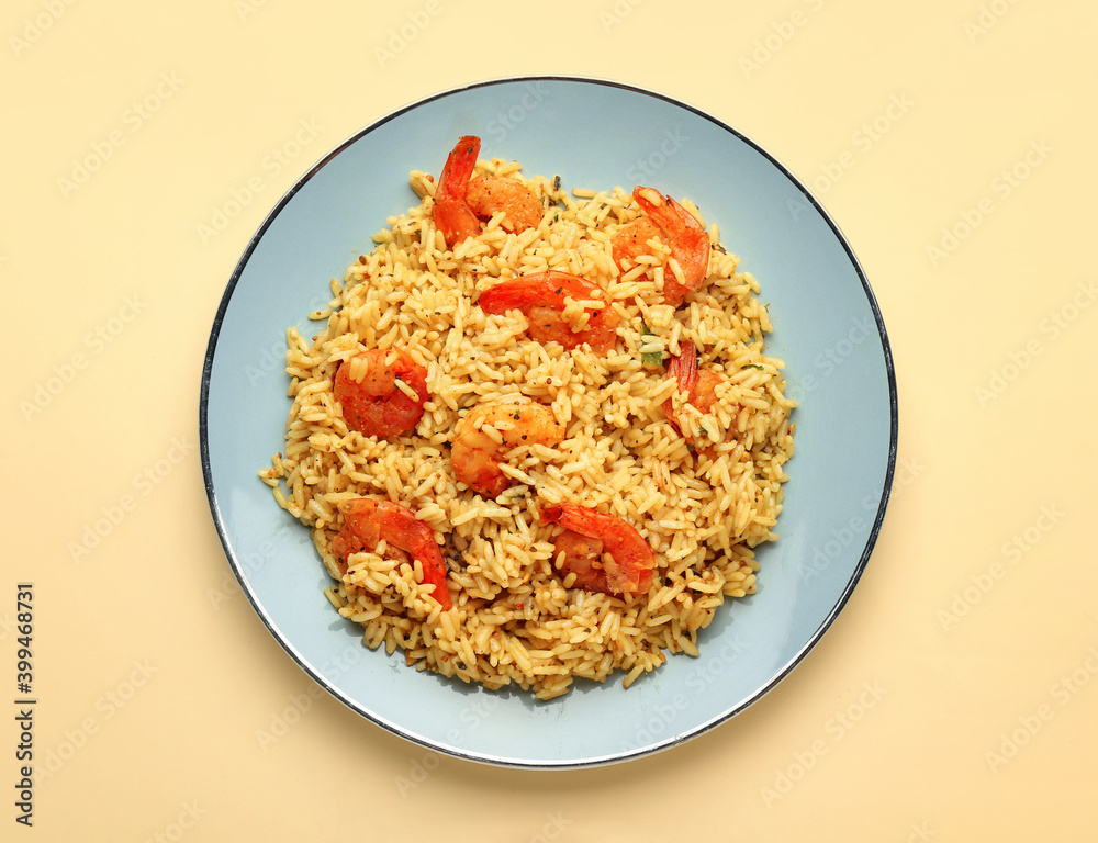 Plate with tasty pilaf on color background Plate with tasty pilaf on color background