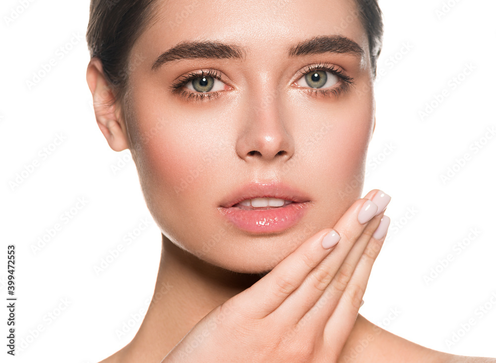 Beautiful woman face with natural make up healthy skin and beautiful eyes Beautiful woman face with natural make up healthy skin and beautiful eyes