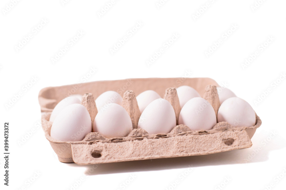 Eggs in a special tray, isolate on a white background. Fresh food from the store. The photo Eggs in a special tray, isolate on a white background. Fresh food from the store. The photo