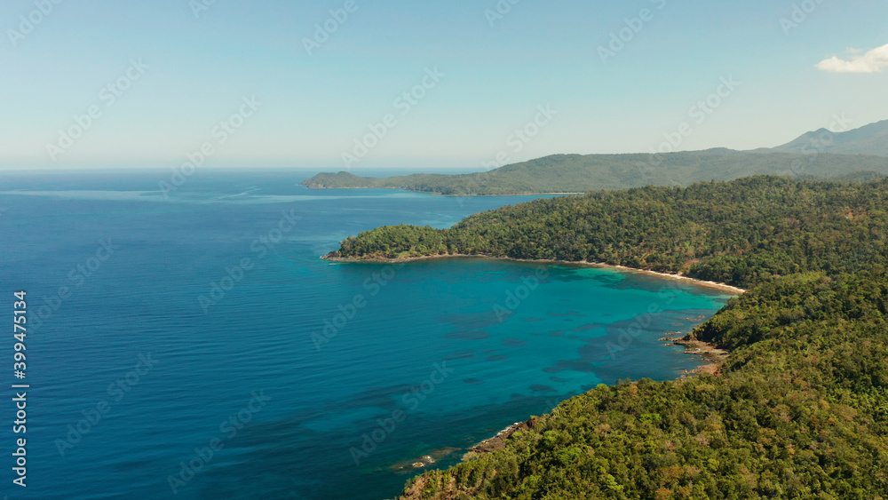 aerial view coastline of tropical island with coral reef and blue lagoon. Palawan, Philippines. tropical landscape. Seascape island and clear blue water. tropical landscape, travel concept