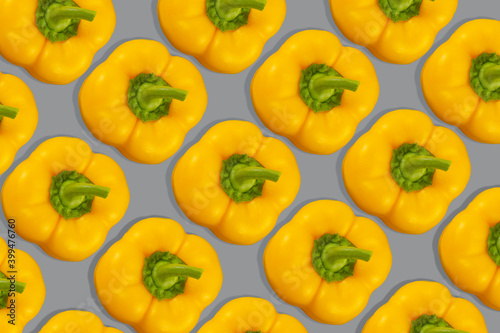 Sweet yellow bell peppers isolated on Ultimate Gray background. Trendy colors of the year 2021 - Gray and Yellow.