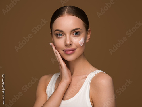 Cream on face woman beauty cosmetic concept healthy hydration skin