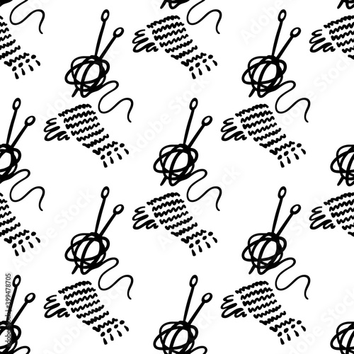 Knitting Scarf and ball of thread. Seamless pattern. Black and white doodle. Vector illustration.