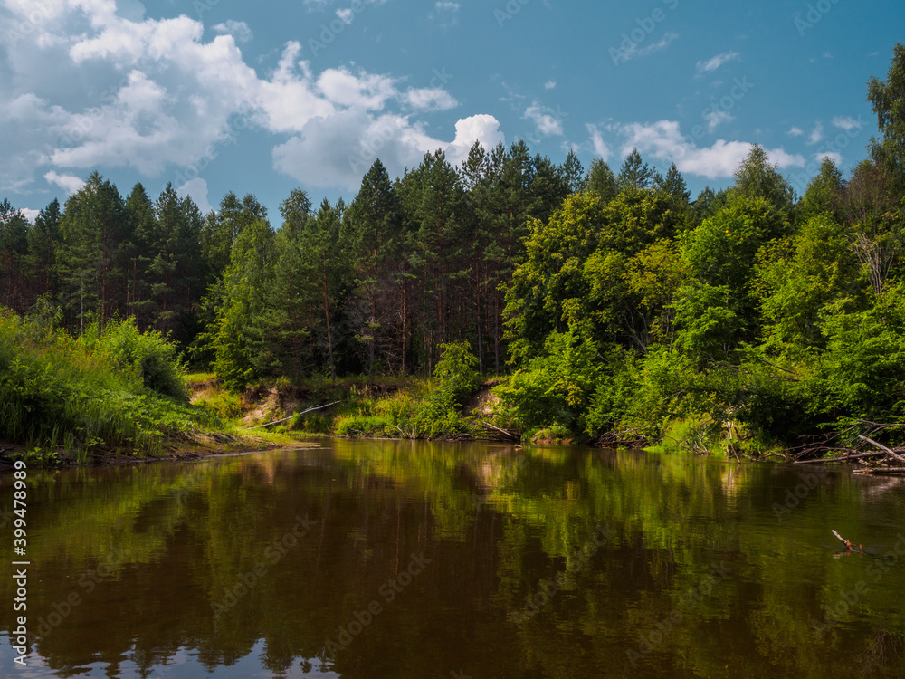 Silence on the river in the middle of the forest. Unique natural locations far from civilisation.