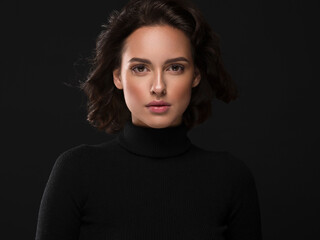 Beautiful woman female portrait face over black background
