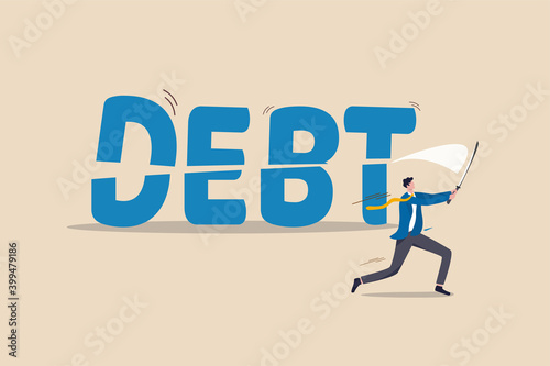 Cut debt, negotiate with bank or debtor to reduce amount of loan and mortgage payment, solution for money management concept, smart confidence businessman cutting or slice the word DEBT in half.