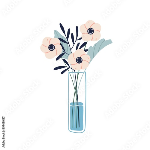 Floristic composition of garden flowers in glass vase. Beautiful bouquet of c...