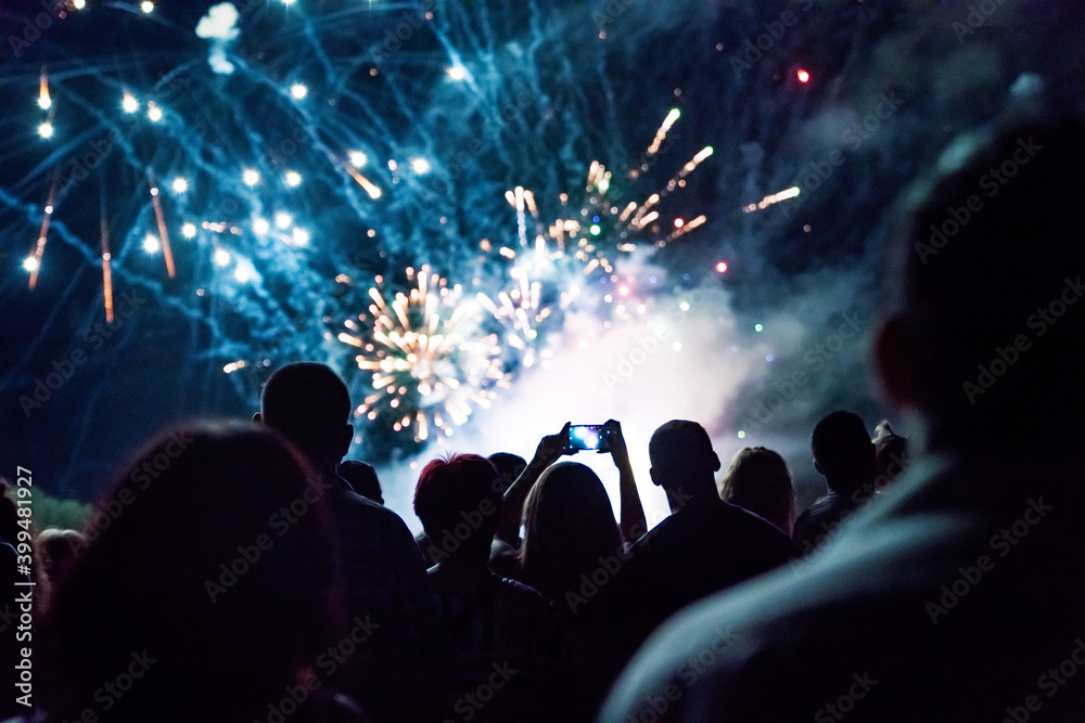 Crowd watching fireworks and celebrating new year