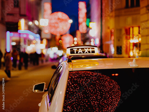 Photography Taxi car during night in the city of Vienna, Austria