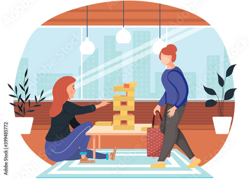 Girl friends playing board logical game together. Female characters sisters playing jenga sitting at table at home. Business meeting of two ladies with intellectual game. Fun holiday with family