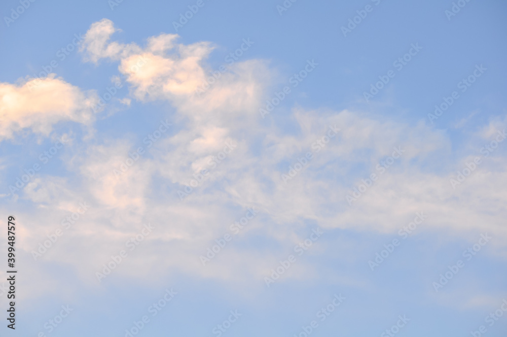Beautiful background of blue sky and white clouds with sun light non focus image.  