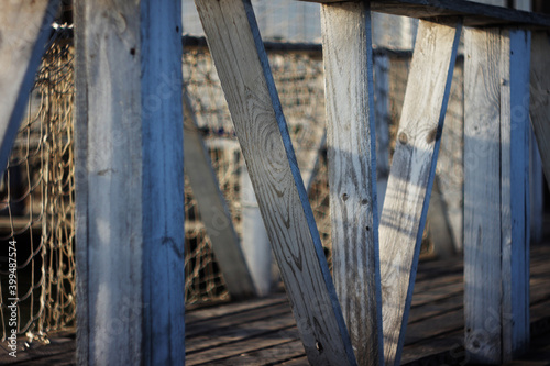 old wooden pier with fishing net