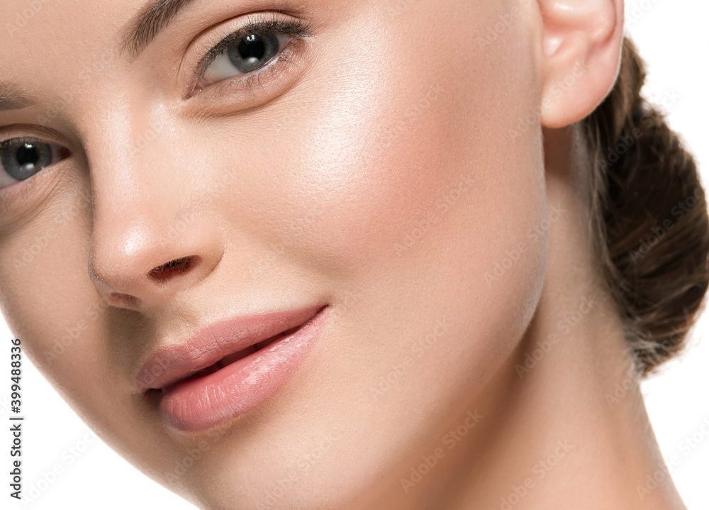Beautiful woman face with healthy clean beauty skin close up Beautiful woman face with healthy clean beauty skin close up