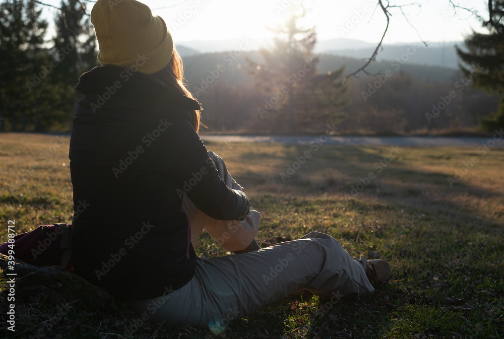 Woman in nature in sunset. People in nature.