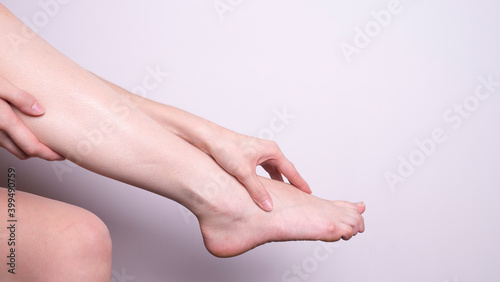 massage of leg muscles with hands, leg pain © Аркадий Коробка