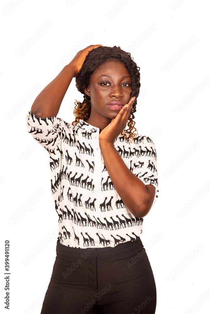 beautiful young woman holding her head beautiful young woman holding her head