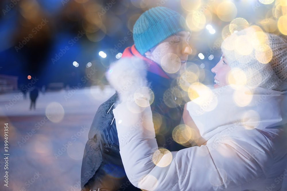 couple on ice rink evening, lovers christmas sport winter holidays couple on ice rink evening, lovers christmas sport winter holidays