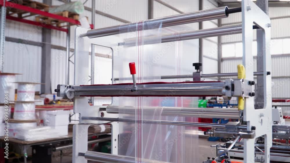 Manufacturing and Automated Technology Concept. Production of Plastic Bags and Polyethylene Zipper. Work Automatic Machine. Recycling, Industry. High quality FullHD footage Manufacturing and Automated Technology Concept. Production of Plastic Bags and Polyethylene Zipper. Work Automatic Machine. Recycling, Industry. High quality FullHD footage