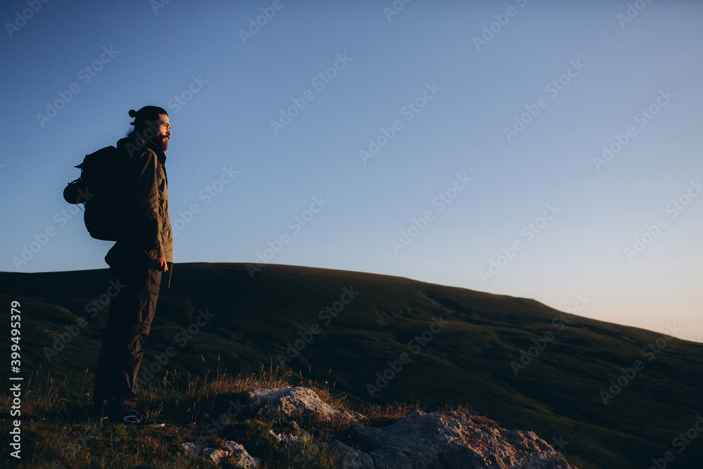 Fototapeta premium A man in nature. Seeker of adventures