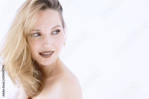 blonde portrait make-up white background   professional bright model make-up blond on white background  portrait of beautiful model