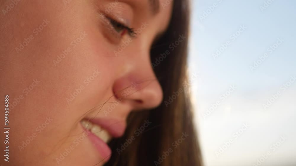 girl face lips hair. portrait of a young girl side view without makeup close-up lips and hair. close-up girl face in nature sunset. fashion beauty woman girl portrait sunset. girl face lips hair. portrait of a young girl side view without makeup close-up lips and hair. close-up girl face in nature sunset. fashion beauty woman girl portrait sunset.