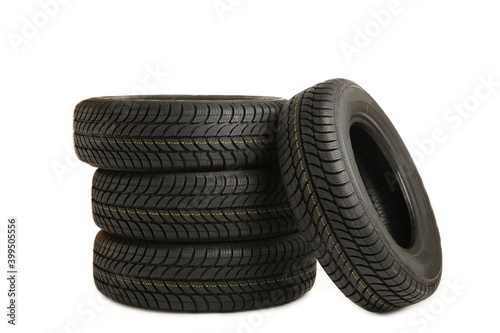 Four new black tires isolated on white background