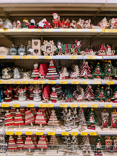 Christmas wooden toys on the shelves in the store.