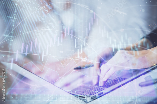 Double exposure of woman hands typing on computer and forex chart hologram drawing. Stock market invest concept.