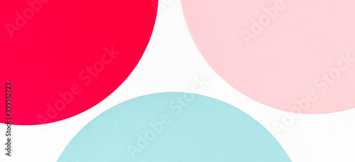 Abstract color paper background. Pastel blue, pink and red color round circle shape geometry composition on white background. Top view