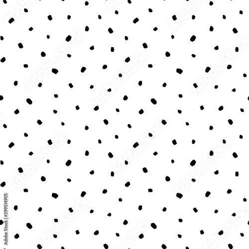 Simple and small black dots seamless pattern. Random scattered blots, abstract black and white background. Freehand drawing vector polka dots. Print, wrapping paper, wallpaper, textile design.