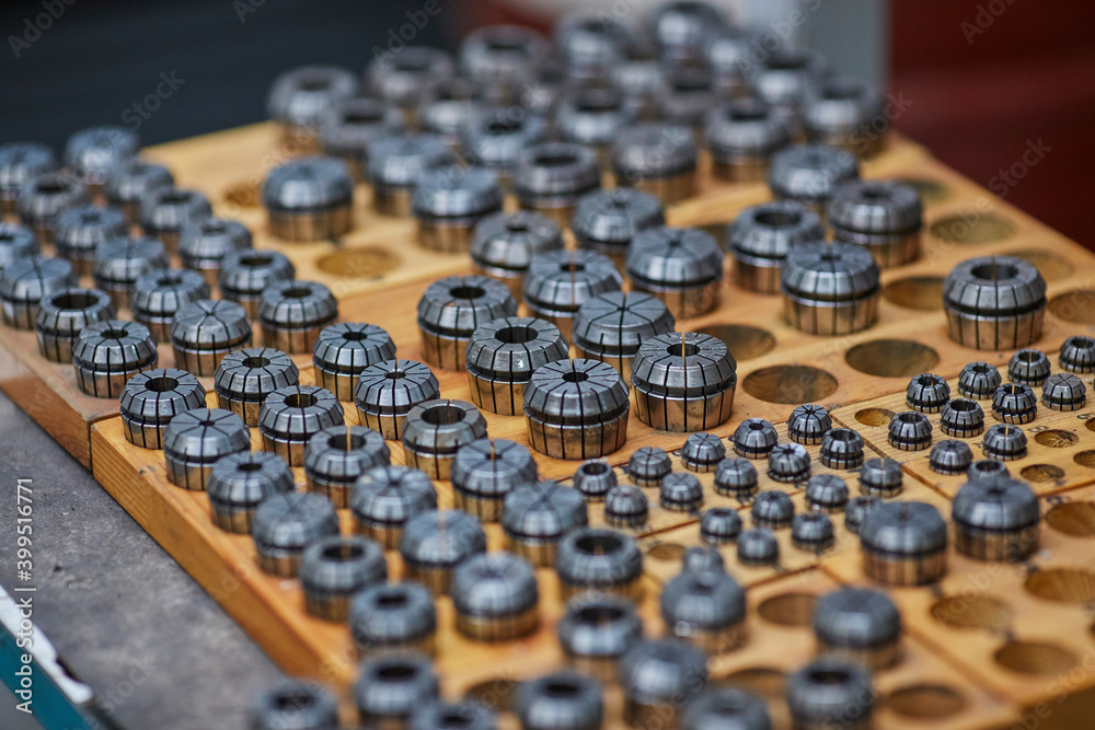 Shiny steel parts . Regular industrial metal production pattern. Shiny steel parts . Regular industrial metal production pattern.