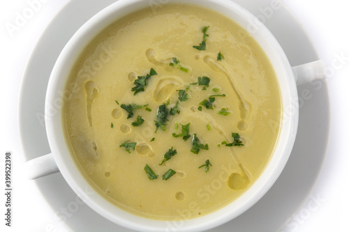 Fresh green asparagus soup in bowl isolated on white background.Copy space 