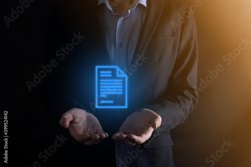 Businessman man holding a document icon in his hand Document Management Data System Business Internet Technology Concept. Corporate data management system DMS