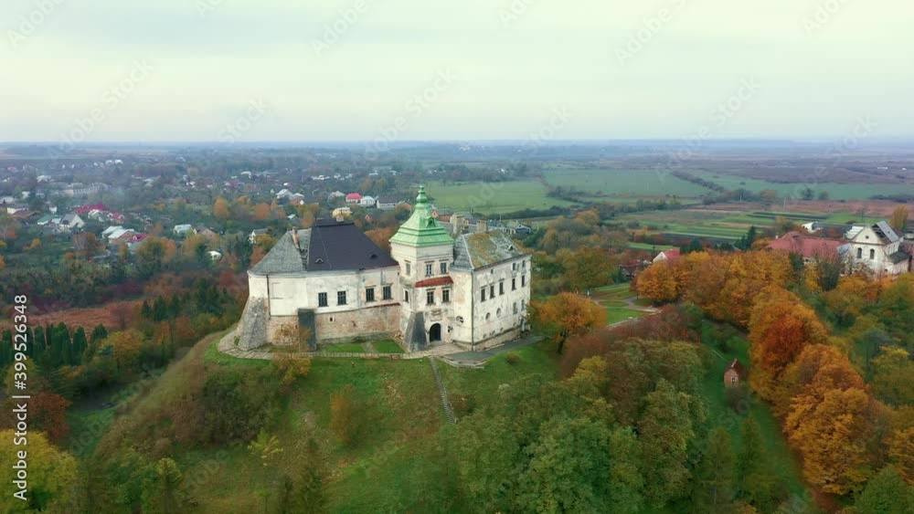 Olesko Palace from the air. Reserve. Summer park on the hills. Aerial view of the Olesky Castle, Ukraine. Olesko Palace from the air. Reserve. Summer park on the hills. Aerial view of the Olesky Castle, Ukraine.