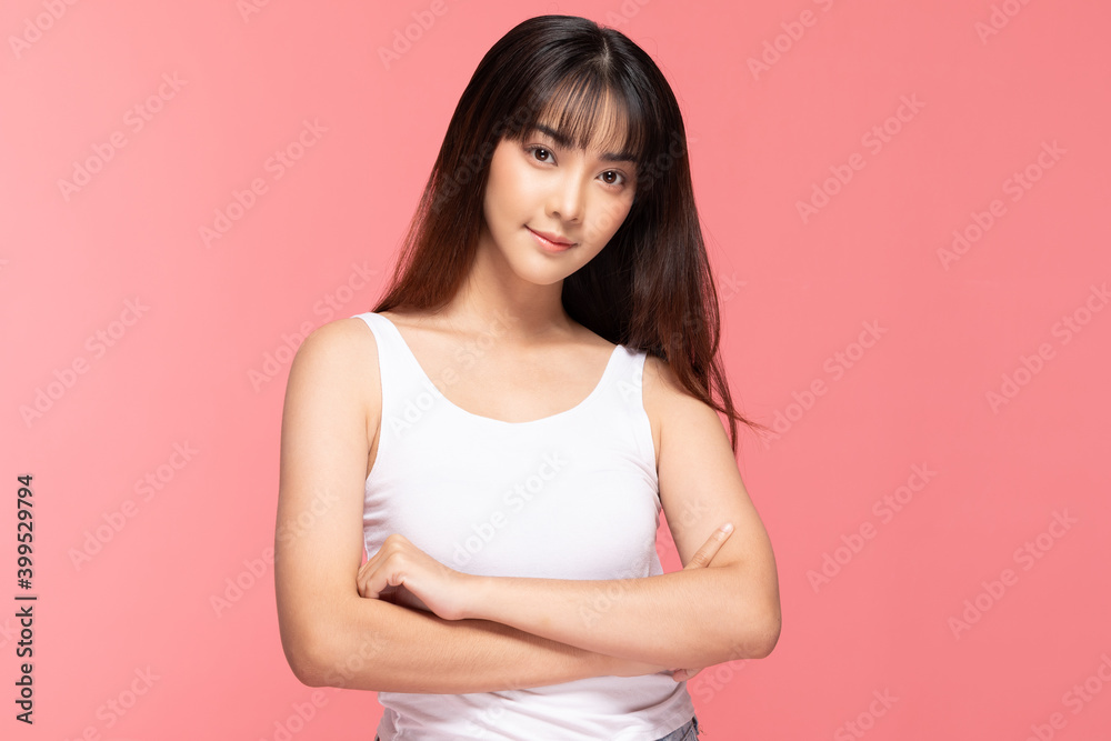 Beautiful Asian woman looking at camera smile with clean and fresh skin Happiness and cheerful with positive emotional,isolated on pink background,Beauty Cosmetics and spa Facial treatment Concept Beautiful Asian woman looking at camera smile with clean and fresh skin Happiness and cheerful with positive emotional,isolated on pink background,Beauty Cosmetics and spa Facial treatment Concept
